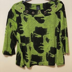 2-pc Face fashion blouse w/ silver embellishments.